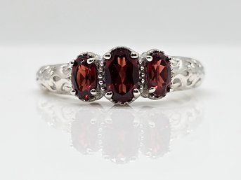 Red Garnet 3 Stone Ring In Platinum Over Sterling