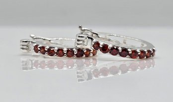 Simulated Garnet Color Diamond Hoop Earrings In Sterling