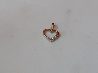 14K Gold Heart With Diamond Chip Accent 0.41 G. TW