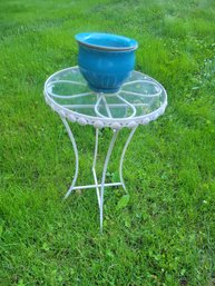 Plant Stand. Wrought Iron With Glass Top And Collapsible. - - - -- - - - - - - - - - - - - - - - - Loc: Garage