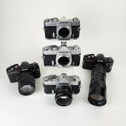 Five Vintage Konica Film Cameras With Three Lenses