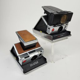 Two Polaroid SX-70 Instant Film Cameras