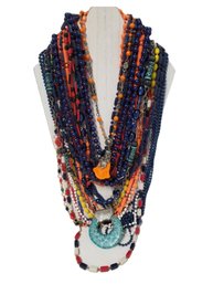 Twelve Colorful Red, White, Blue, Yellow & Orange Long Beaded Necklaces