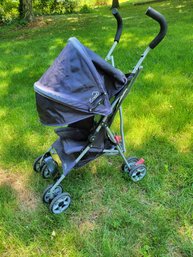 Kolacraft Stroller. Foldable And Has The Sun Hood.