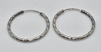 Diamond Cut Hoop Earrings In Sterling