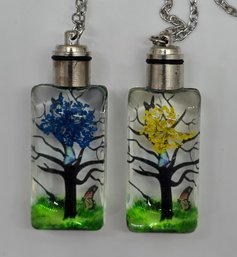 Two White Glass LED Pendant Necklaces In Stainless Steel