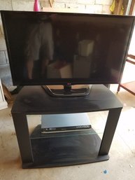 39'LG - LED HD TV, DVD Player And TV Stand Combo