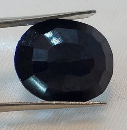 15 Ct Tested Deep Blue Sapphire With Heavy Inclusions