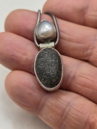 Stunning Artisan Made Bezel Pendant With Natural Pearl And Rough Basalt Cabochon On A Silver Snake Chain