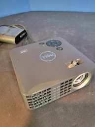 Dell Mobile Mini LED Projector. Model M115HD. Tested And Powers On .  - - - - - - - - - - - - - Loc: S1 Floor