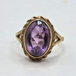 Amethyst Solitaire Ring With Gold Twisted Bezel Setting