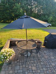 Wrought Iron Patio Set With 4 Chairs / 8' Market Umbrella / White Wrought Iron Umbrella Base. - - - Loc: Patio