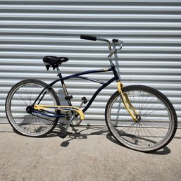 Raleigh Blue And Yellow Bike