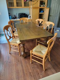 Solid Wood Table ( With A Story )  And 6 Chairs.