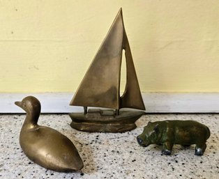 MCM Brass Paperweight /desktop Figurines Including A Sailboat, Hippo & Duck