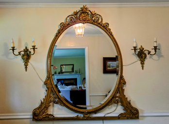 Large Antique Carved Hollywood Regency Gilded Wall Mirror With Ornate Crest And Edgework