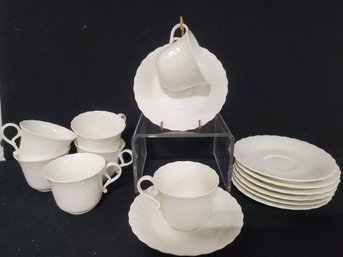 Eight Vintage Mikasa White Silk Bone China Cups & Saucers