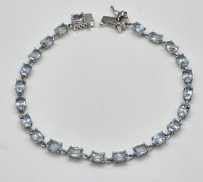 Blue Topaz Bracelet In Platinum Over Sterling