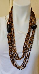 Long Multi-strand Beaded Tigers Eye Necklace With 2 Large Accent Beads In Black Onyx