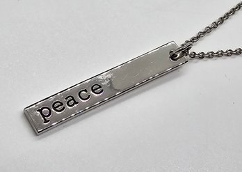 Pretty Silvertone Peace Necklace