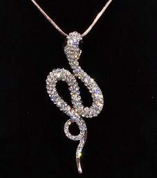 Black Glass, White Austrian Crystal Snake Pendant Necklace In Rosetone