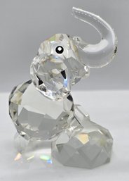 Crystal Elephant Standing On A Drum