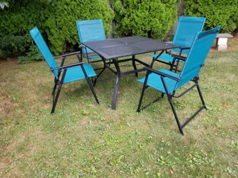 Weatherington Blue Moon Outdoor Dining Table And Folding Armchairs