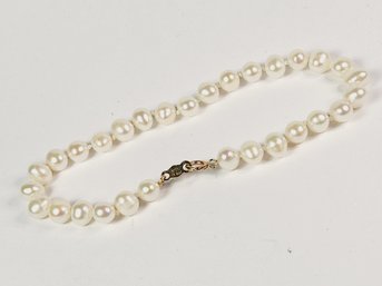 Elegant 14k Yellow Gold Pearl Bracelet