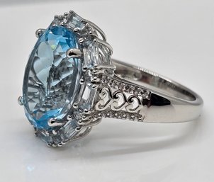 Sky Blue Topaz, White Zircon Halo Ring In Platinum Over Sterling