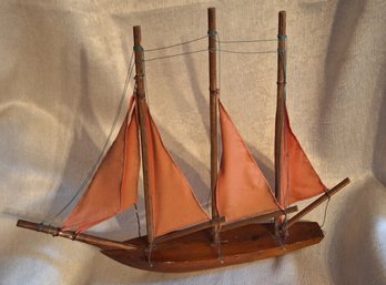 Vintage Wooden Sailboat Model With Red Sails