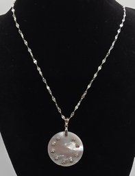 White Mother Of Pearl Comma Tanzanite Pendant Necklace In Sterling