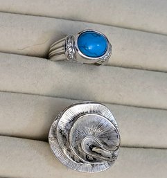 Two Polished Silver Rings With Turquoise 'eye' Flanked By Pave Crystal Stones