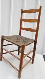 ANTIQUE OAK LADDER BACK CHAIR WITH RUSH WOVEN SEAT