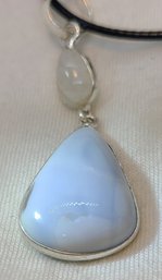 Silver Plated Blue Opal And Moonstone Pendant On A Black Rope Adjustable Necklace