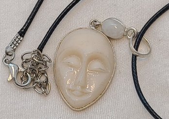 Silver Plated White Carved Face Pendant With Moonstone On Rope Necklace