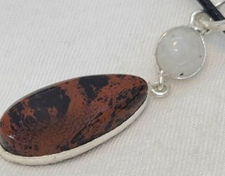 Silver Plated Mahogany Jasper And Moonstone Pendant On An Adjustable Rope Necklace