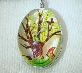 Another Encased Glass Pendant With A Yellow Tree And Butterflies On A Black Rope Necklace