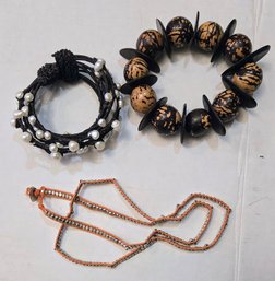 2 Beaded Wrap Bracelets With Natural Pearl And Metallic Beads And 1 African Inspired Chunky Stretch Bracelet