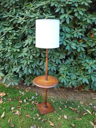 Mid Century Floor Lamp With Mid Height Shelf.