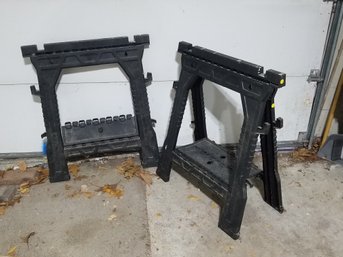 Two Black Plastic Saw Horses