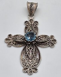 Cross Pendant With Blue Topaz In Sterling