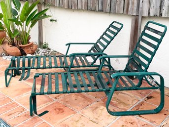 A Pair Of Vintage Tubular Aluminum Lounge Chairs