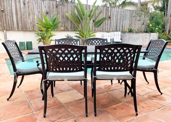 A Beautiful Cast Aluminum Outdoor Dining Table And Set Of 6 Chairs By Cast Classics