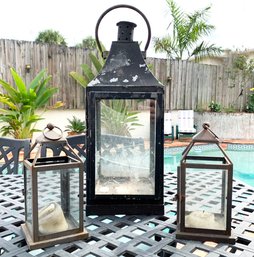 A Trio Of Outdoor Lanterns