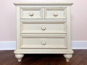A Painted Wood Nightstand By Wynwood Furniture