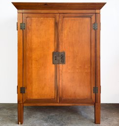 A Large Wardrobe Or Bar Cabinet By Pottery Barn In Asian Style