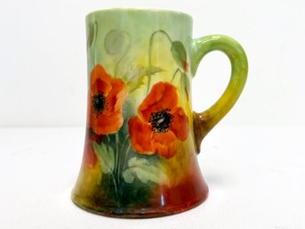 A Hand Painted Belleek Coffee Mug