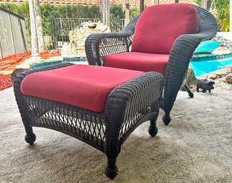 A Woven Acrylic Outdoor Arm Chair And Ottoman