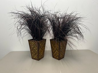 A Pair Of Faux Grass Arrangements