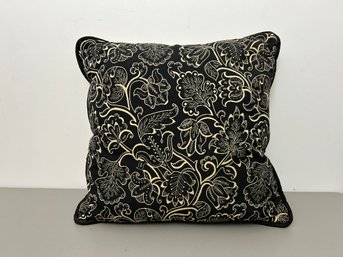 An Elegant Black And Gold Floral Pillow